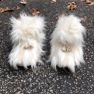 I am selling furry indoor slippers